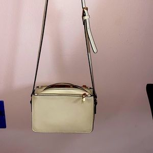 Creme coloured shoulder strap purse